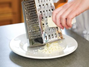 Grate the butter directly into the bowl in order to soften it.